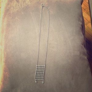 Long silver lucky brand necklace, never used.